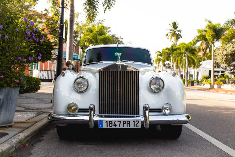 Old white car for weddings