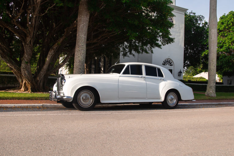 Old white car for weddings