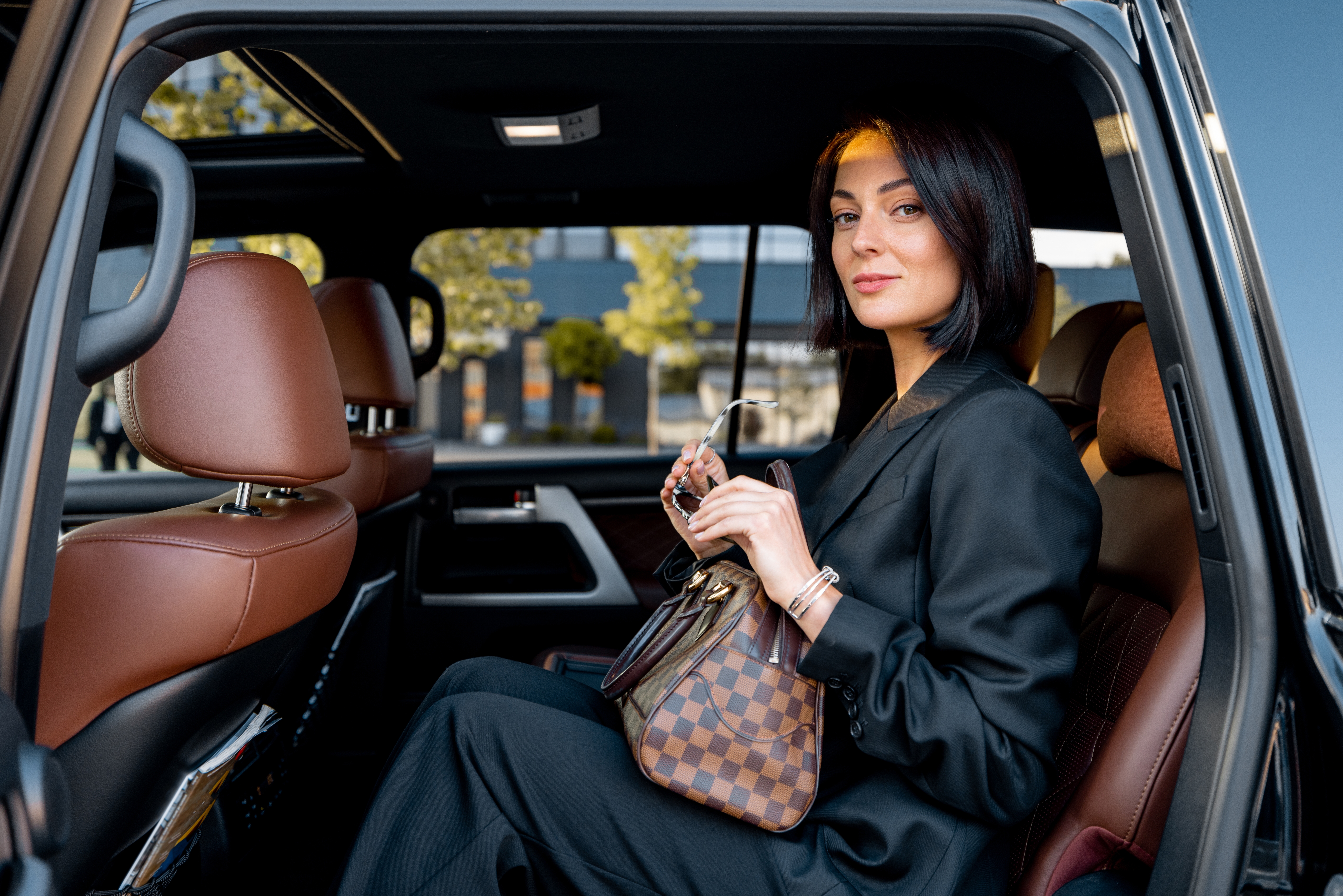 Portrait Of An Elegant Business Lady In Black Formal Wear